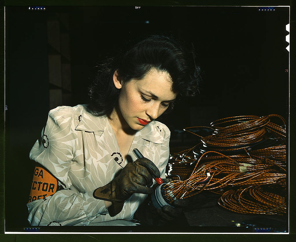 Woman aircraft worker, Vega Aircraft Corporation, Burbank, Calif. Shown checking electrical assemblies  (LOC)