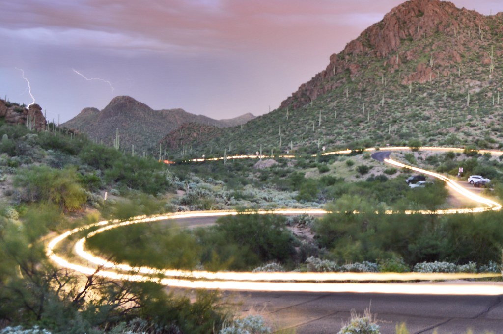 Light trail and distant lightnight