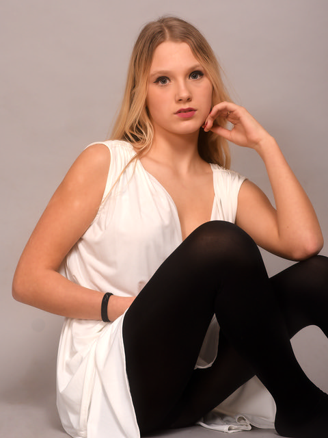Blonde in white dress