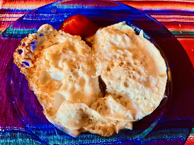 Two Fried Eggs Over Easy With Ketchup For Dinner