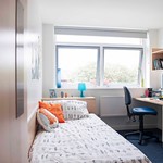 Rooms include single beds and plenty of storage