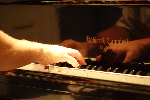 Mike Lemmler at the piano, performing with Ray Moore at WWOZ for Fall Pledge Drive. Photo by www.leonastrassbergsteiner.com