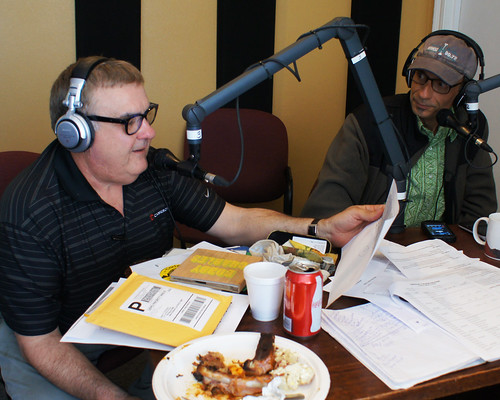 Boudin Man and Old Man River pitch at WWOZ. Photo by Bill Sasser.